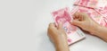 Chinese Senior woman counting money for payment Royalty Free Stock Photo