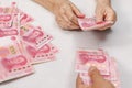 Chinese Senior woman counting money for payment Royalty Free Stock Photo