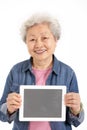 Chinese Senior Woman Holding Digital Tablet Royalty Free Stock Photo