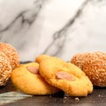 Chinese Sesame Balls And Almond Cookies Royalty Free Stock Photo