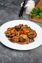 Chinese shiitake mushrooms stewed with meat in a white plate Royalty Free Stock Photo