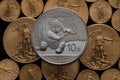 Chinese Silver Panda wins of US Gold Eagle Coins