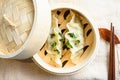 Chinese snacks. chinese steamed dumpling. Chinese Traditional cuisine in wooden steamer, dumplings snack , on linen cloth served Royalty Free Stock Photo