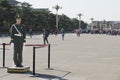 Chinese Soldier waiting for tourists. Soldier guarding the Tiananmen Squarei in Beijing, China