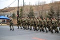 Chinese soldiers running in Tumen, Jilin province, China, river border between North Korea and China