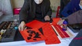 China, Spring Festival, calligrapher, handwritten Spring Festival couplets, brush characters, Chinese Spring Festival
