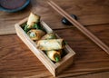 Chinese spring rolls with sweet sauce. Fried Vietnamese spring rolls with sweet chili sauce. Asian appetizers or snacks Royalty Free Stock Photo