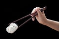 Chinese steamed barbecue pork bun with chopsticks (Dim Sum) Royalty Free Stock Photo