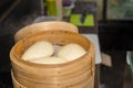 Chinese steamed bun in bamboo steamed at outdoor food festival Royalty Free Stock Photo