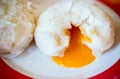 Chinese steamed bun and orange sweet creamy lava on chinese pattern dish Royalty Free Stock Photo