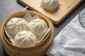 Chinese steamed buns on wood container , selective focus Royalty Free Stock Photo