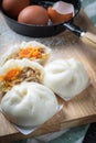 Chinese steamed buns on wood container , selective focus Royalty Free Stock Photo