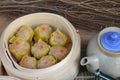 Chinese steamed dumpling and hot tea delicious. Royalty Free Stock Photo