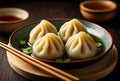 Chinese steamed dumplings in a bowl on a wooden table