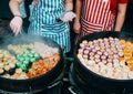 Chinese steamed pork dumpling in green and yellow color. Easy snack street food in Thailand. Asian food dim sum with shrimp in Royalty Free Stock Photo