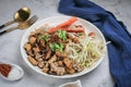 Chinese Steamed Rice Noodles with pork ,sausage,imitation Crab Stick,boil bean sprouts,mushroom and tofu in sweet soy sauce in whi