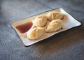 Chinese steamed rolls on white plate Royalty Free Stock Photo
