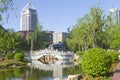 Chinese stone arch bridge architecture on the lake in a park. Royalty Free Stock Photo