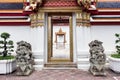 Chinese stone lion statue in the tourist attractionat at Wat Pho Royalty Free Stock Photo