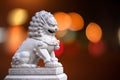 Chinese Stone Lion in Thai temple isolated on white background.Beside Royalty Free Stock Photo