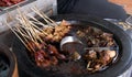 Spicy Chinese street food on sticks