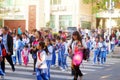 Chinese students home after school through traffic intersection