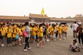 Chinese students and a little boy in Forbidden city in Beijing, China