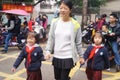 Chinese students at noon on his way home from school Royalty Free Stock Photo