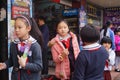 Chinese students at noon on his way home from school Royalty Free Stock Photo