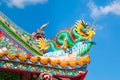 Chinese style dragon statue on temple roof Royalty Free Stock Photo