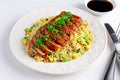 Chinese style Egg fried rice with sliced pork fillet Royalty Free Stock Photo