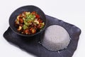 Chinese style kung pao chicken with jasmine rice in a black plate Royalty Free Stock Photo