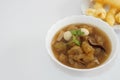 Chinese style soup or braised fish maw in red gravy. Copy space on the left. Royalty Free Stock Photo