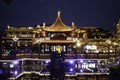 Chinese-style wooden buildings in Shanghai Yu Garden illuminated by lights