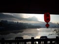 Chinese sytle red light and lake view in the morning at Ban Rak Thai village, Mae Hong Son, Thailand