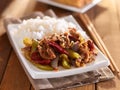 Chinese szechuan beef with rice on plate