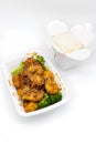 Chinese Takeout of Sesame Chicken and White Rice Royalty Free Stock Photo