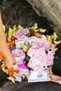 Chinese taoism tradition burn paper money and gold to ancestors