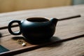 Chinese tea ceremony. Ceramic teapot made of clay and bowls. Generative ai Royalty Free Stock Photo