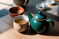 Chinese tea ceremony. Ceramic teapot made of clay and bowls. Generative ai Royalty Free Stock Photo