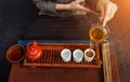 Chinese tea ceremony is perfomed by tea master in kimono