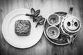 Chinese tea set with mooncake and red flowers in natural light