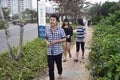 Chinese teenagers chewing the nut of binlan