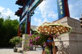 Chinese Temple Gate and Flower Girl