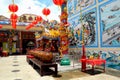 Chinese temple with urns art and red lanterns and Thai flag Pattani Thailand Royalty Free Stock Photo