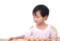 Chinese three-year-old girl seriously plays Chinese chess with her opponent