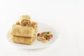 Chinese tortillas - bings in plate with mushrooms on a white background.
