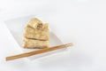 Chinese tortillas - bings in plate on a white background.