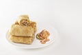 Chinese tortillas - bings in plate on a white background.