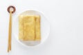 Chinese tortillas - bings in a plate on a white background.View from above.